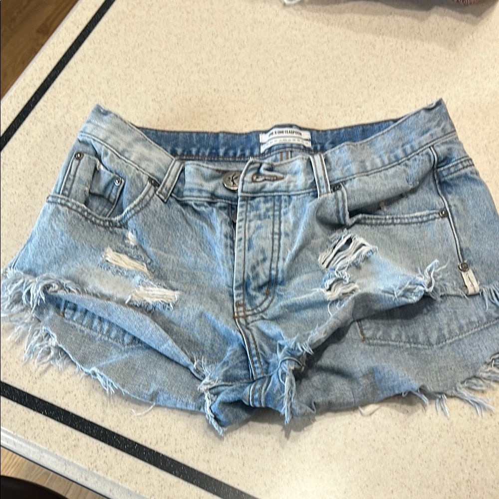 Distressed Light Blue Denim Shorts
